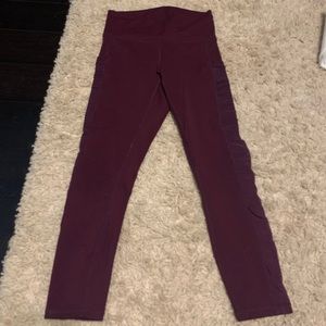 Dark maroon colored leggings